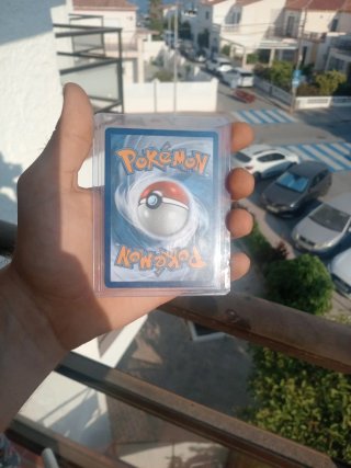 Carta Pokémon Mega Charizard EX Dorada 125/094