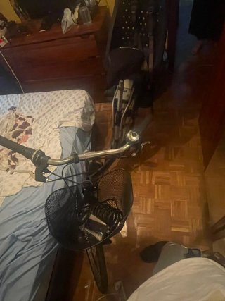 Bicicleta con silla para niño y cesta