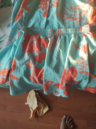Conjunto playero floral naranja y turquesa