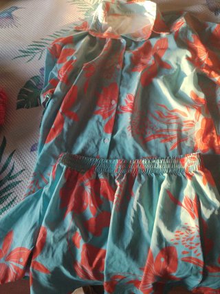 Conjunto playero floral naranja y turquesa