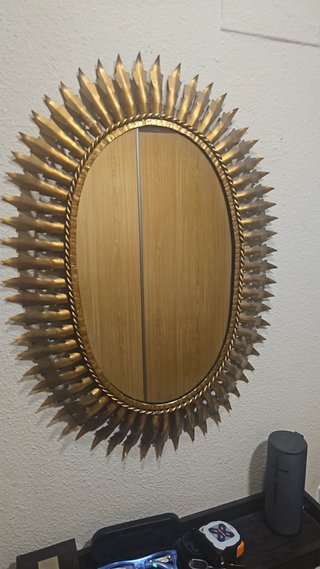 Espejo Ovalado Dorado con Marco Decorativo