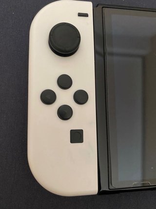 Nintendo Switch OLED Blanca y Negra + Juegos