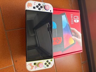 Nintendo Switch OLED Blu/Giallo completa di tutto