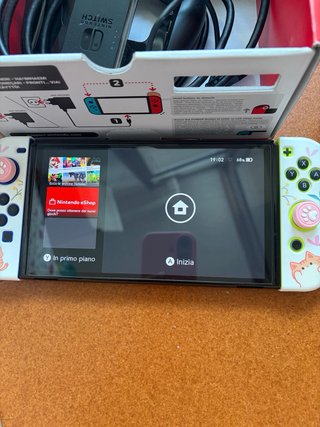 Nintendo Switch OLED Blu/Giallo completa di tutto