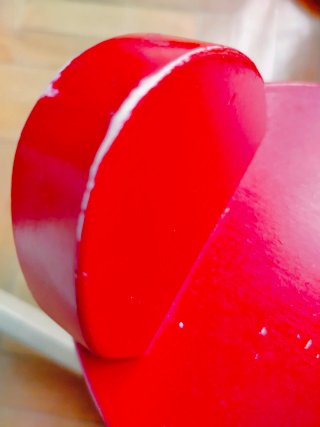 Reno balancín madera y metal rojo