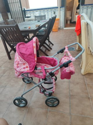 Carrito de muñecas flores rosa