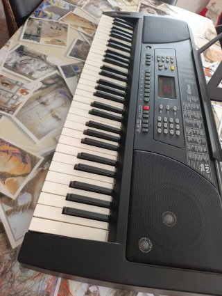 Piano eléctrico 100 estilos y voces