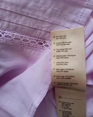 Blusa rosa con lazada y detalles