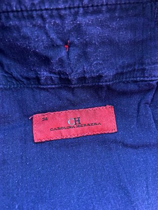 Jeans CAROLINA HERRERA morados, corte recto.