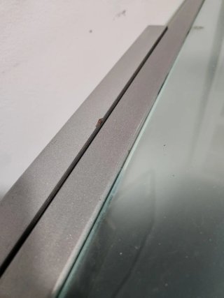Mesa extensible cristal y metal