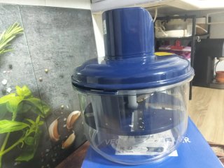 Pelador azul y transparente