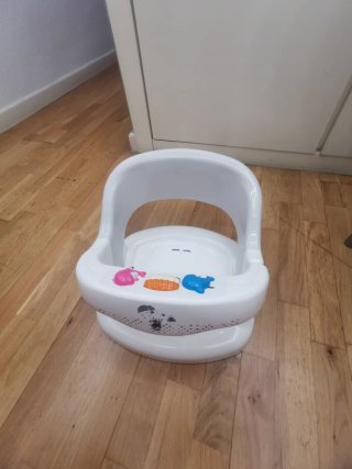 Asiento de baño para bebé con juguetes