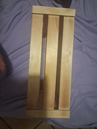 Caja de madera decorada con estrellas