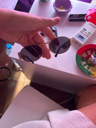 Occhiali da sole Versace dorati e neri
