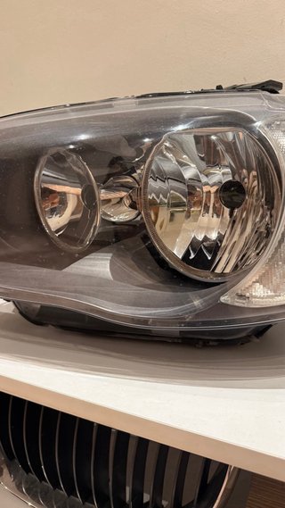 Faro OEM BMW Serie 1 E81/E87 Izquierdo