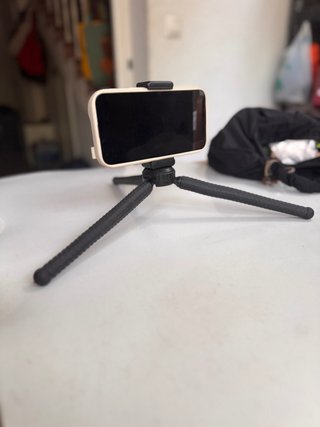 Mini trípode versátil