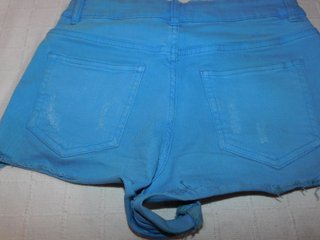 Shorts azules rotos
