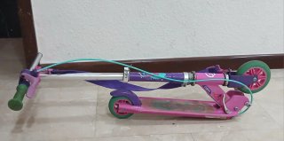 Patinete Oxelo rosa y morado