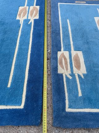 Juego de 2 alfombras azules y beige