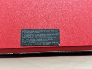 PlayStation 3 Super Slim Rossa