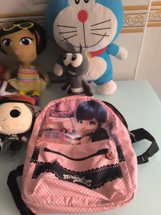 Peluches y mochila reversible Ladybug