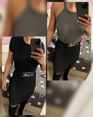 Falda tubo negra con efecto brillante.