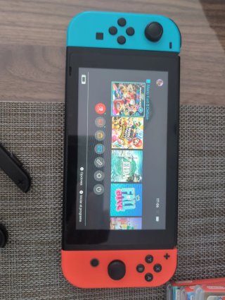 Nintendo Switch + 4 Juegos