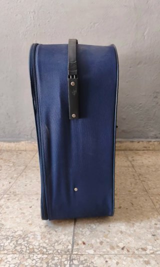Maleta grande de tela azul y marrón
