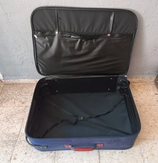 Maleta grande de tela azul y marrón