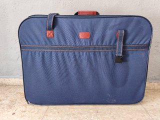 Maleta grande de tela azul y marrón