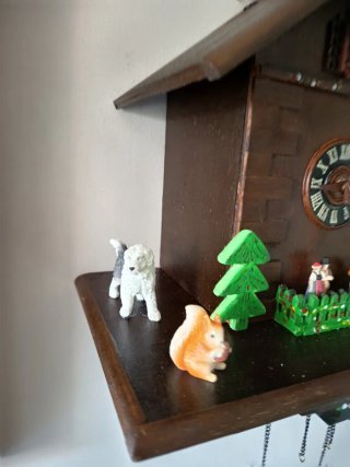 Orologio a cucù in legno con giostrina