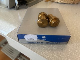 Máquina para forrar botones