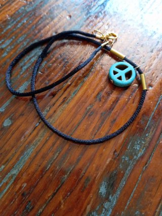Collana con ciondolo simbolo pace