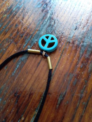Collana con ciondolo simbolo pace
