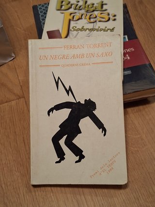 Un negre amb un saxo