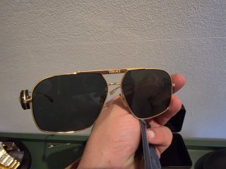 Occhiali da sole Versace neri e dorati