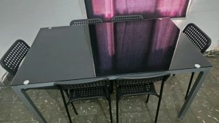 Mesa de cristal oscuro para 6 sillas