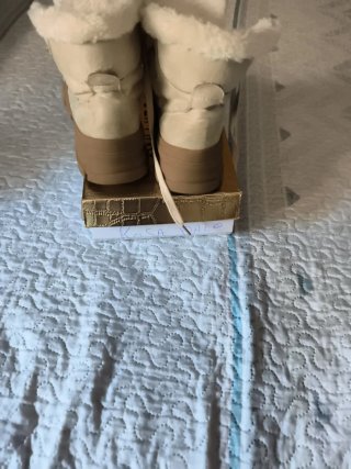 Botines de pelo beige y blanco