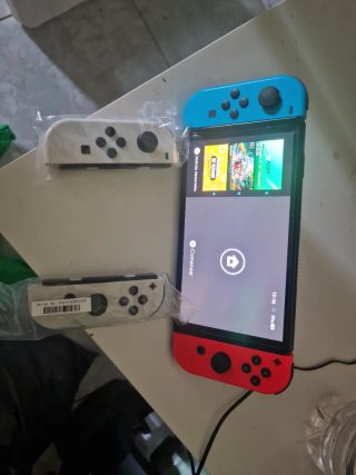 Nintendo Switch OLED Azul/Rojo Seminueva