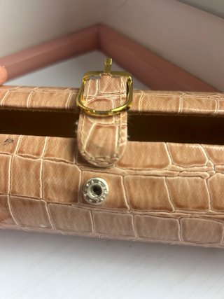 Joyero de viaje beige con compartimentos