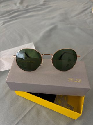 Gafas de sol Hawkers doradas redondas