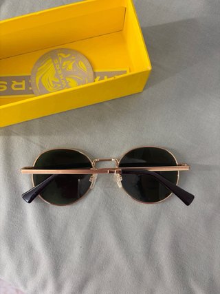 Gafas de sol Hawkers doradas redondas