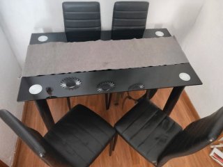 Mesa cristal 4 sillas negro Se vende por no usar