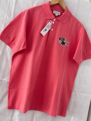 Polo Lacoste classic fit Rosa con Logo bordado.