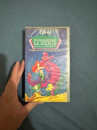 Películas VHS Pokémon y la sirenita.