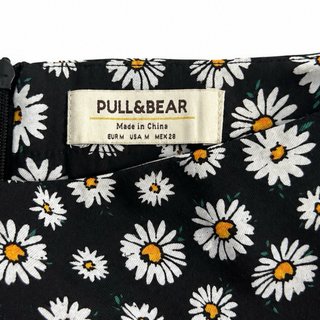Falda corta estampada de margaritas