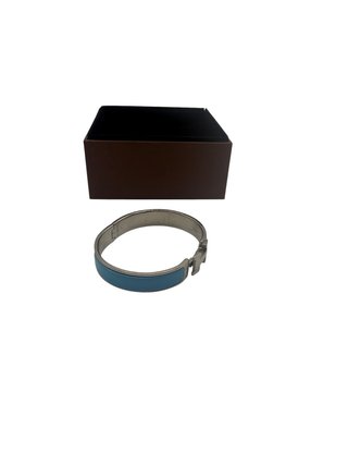 Pulsera Hermès Clic H Azul y Dorada