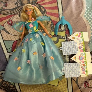 Barbie Ruiseñor Songbird con pájaro funcionando.