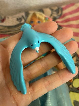 Barbie Ruiseñor Songbird con pájaro funcionando.