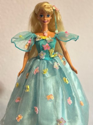 Barbie Ruiseñor Songbird con pájaro funcionando.